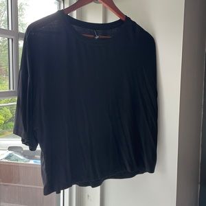 Short sleeve, slight black t-shirt. Super soft!